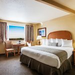 This Whirlpool Tub room has a more distant view. Sit and relax on the deck with tables, umbrellas and chairs and watch the waves and sunsets.